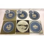 Wedgwood Christmas plates to include 1975, 1976, 1977, 1978 and 1980 together with a Royal Grafton