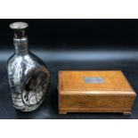 A silver overlaid Haig whiskey decanter of dimpled form with silver hallmarked stopper 23cm h