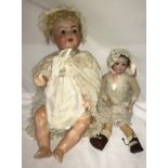 Two bisque headed dolls to include Armand Marseille, Germany No 390 with blue sleeping eyes 48cm,