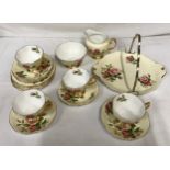 Royal Albert part tea service decorated in the 'English Beauty' pattern to include 4x tea cups, 6x