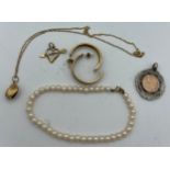 9ct gold hoop earrings along with a 9ct pendant, silver medal, unmarked heart plus pearl bracelet