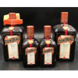 Four bottles of Cointreau two litre bottles and two 350 millilitres.