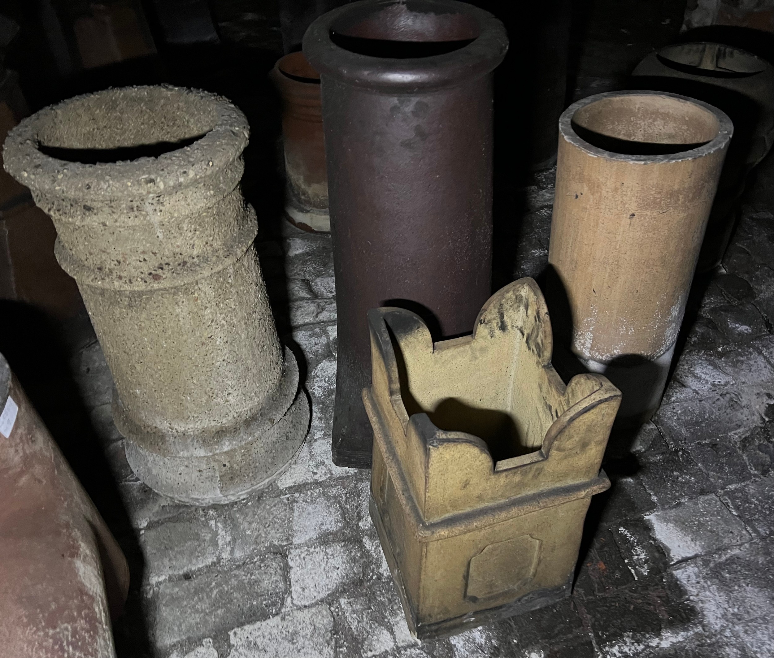 Four various chimney pots tallest 83cm h