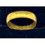 A 22 carat gold wedding ring. Weight 3.5gm.