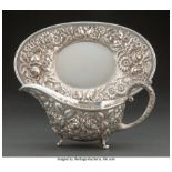 A J. E. Caldwell & Co. Silver Chased Repoussé Gravy Boat and Underplate, Philadelphia, Pennsylvania,