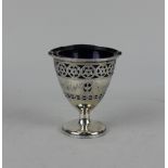 A George III silver sweetmeat basket circular pedestal form with pierced banded decoration and