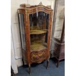 A Vernis Martin style gilt metal mounted vitrine with shaped top above a glazed door and glazed