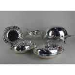 A silver plated revolving domed covered oval tureen two silver plated oval entree dishes and covers,