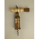 A Heeley & Sons Thomason type corkscrew brass barrel with makers badge, bone handle and brush