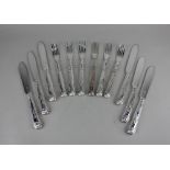 A set of six Victorian Kings pattern silver fish knives and forks with silver blades and filled