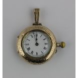 A Continental 14k gold pendant watch with engraved decoration, diameter 3cm