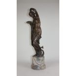 A bronze classical figure of a woman with a dolphin at her feet, on veined hardstone plinth, 65cm