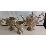 A Victorian classical style electroplated three piece tea set to include teapot, sugar bowl and