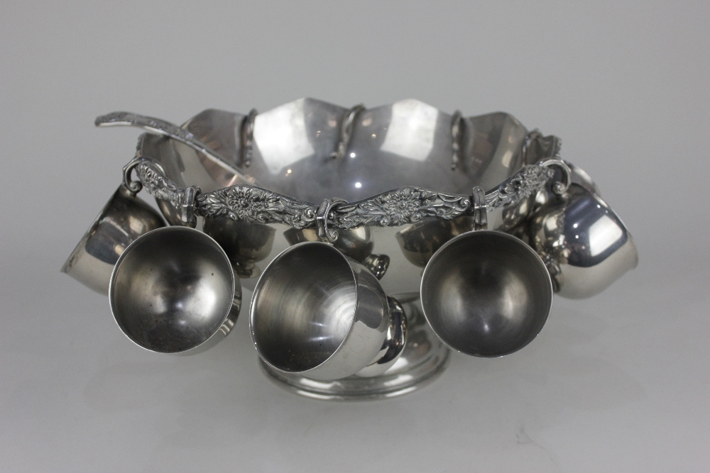 A silver plated punch bowl with cast scalloped border, nine hanging cups and ladle, 31cm (a/f) - Image 2 of 3