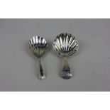 Two George III silver caddy spoons with shell shaped bowls maker Thomas Streetin London 1803 and the