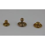 Three gold studs 2.5g mixed carats