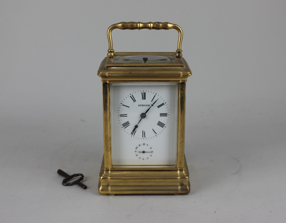 A brass cased repeater carriage clock by Berger, striking on a gong, 18.5cm high, with key