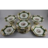 An impressive late 19th early 20th century Coalport porcelain part dessert service to include