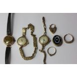 A lady's 9ct gold wrist watch; a 9ct gold bracelet watch; a 9ct gold padlock clasp; 9ct gold