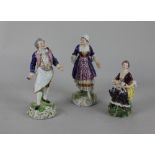A Bloor Derby porcelain figure of a lady seated with a cat 13cm high, together with a pair of