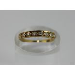 A half hoop diamond eternity ring, set in 18ct gold