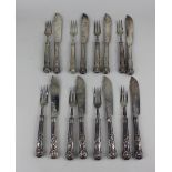 A set of eight pairs of Victorian silver Kings pattern fish knives and forks with engraved silver