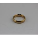 An 18ct gold wedding band, 11.2g