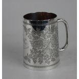 An Edward VII silver christening mug engraved decoration of birds in branches, presentation