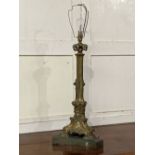 A Rococo style gilt metal table lamp on scrolling triform platform base, 68cm high