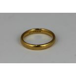 A 22ct gold wedding band, 5.5g