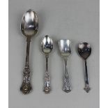 A Victorian silver Kings pattern table spoon and three other smaller spoons including a Scottish