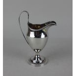 A George III silver cream jug neo-classical style with engraved initials, marks rubbed probably