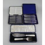 A pair of George V silver fish servers with mother of pearl handles, maker Viners Sheffield 1934,