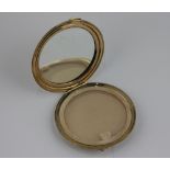 A 9ct gold compact case with fitted mirror, maker Adie Bros. Birmingham 1947 gross weight 55g 7cm