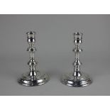 A pair of modern silver candlesticks baluster shape on loaded circular bases (a/f) maker JA Campbell