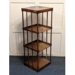 A 19th century mahogany four-tier whatnot, with slatted sides, on turned supports 37.5cm (a/f)