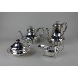 An Elkington & Co silver plated tea pot and matching coffee pot fluted melon shape with scroll