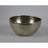 A white metal possibly Indian circular bowl, 2.1oz, 9cm