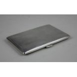 A modern silver cigarette case rectangular shape with engine turned engraving, inner cover with