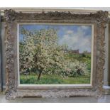 Fernand Pinal (French 1881-1958), apple tree in blossom, with village beyond, oil on canvas, signed,