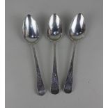 A pair of George III silver Old English pattern tablespoons with bright cut engraving and