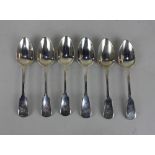 A set of six George IV silver Fiddle pattern dessert spoons engraved with initials and lion rampant,