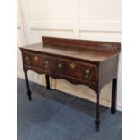 A 18th / 19th oak dresser with two drawers (one converted) shaped frieze on turned and block legs,