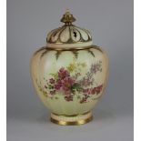 A Royal Worcester blush ivory porcelain pot pourri with inner lid and reticulated cover, the lobed