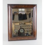 An inlaid cushion framed rectangular wall mirror 55.5cm by 45cm (replaced glass)
