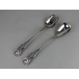 A pair of Victorian Kings pattern silver salad servers with engraved figurehead armorial, maker John