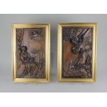 A pair of gilt framed carved wood plaques depicting an angel and a seated figure reading, 38cm by