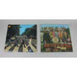 Two LP records for The Beatles comprising Sgt Peppers Lonely Hearts Club Band, stereo recording, and