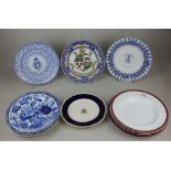 A collection of eight 19th century armorial plates and bowls, to include two Copeland bowls with