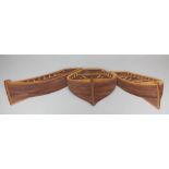 A large wooden wall plaque of three boats 113cm wide